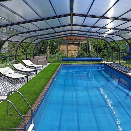 La Petellerie, maison de campagne avec piscine pour un séjour détente Moyon Esterno foto